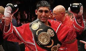 Amir Khan impressively beat Devon Alexander to defend his WBC Silver Welterweight title.